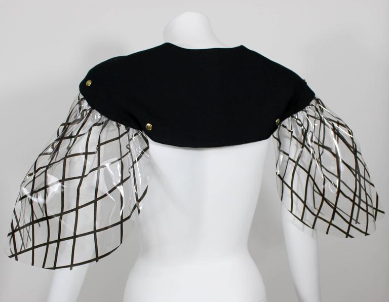 Yves Saint Laurent Black and Clear PVC Cape. Fall 2010 Runway Look #14